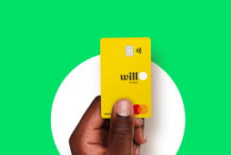 uma mão segurando o cartão de crédito will bank