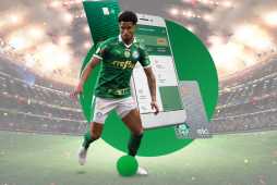 jogador do Palmeiras em destaque e Palmeiras Pay ao fundo