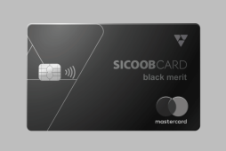 cartão Sicoobcard Black Merit em um fundo cinza
