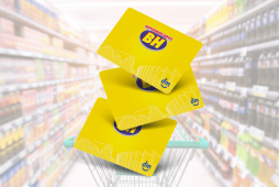 cartão supermercados bh com imagem de supermercado ao fundo